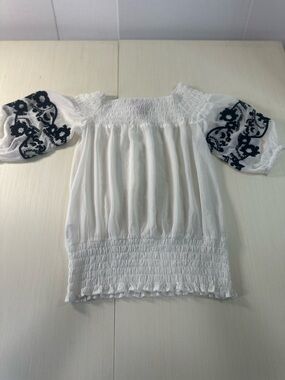 Twelve by Twelve White Smocked Top with Black Embroidery and Pink Label